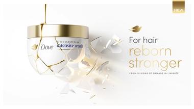 A jar of Dove Intensive Repair hair mask. Text reads: ‘For hair reborn stronger from 10 signs of damage in 1 minute’.