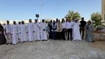 Unilever and JAFZA teams planting trees.