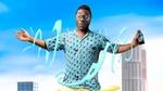 A photo from an Axe advertising campaign featuring a young Black guy with spectacles. Text reads ‘Smell irresistible all day”