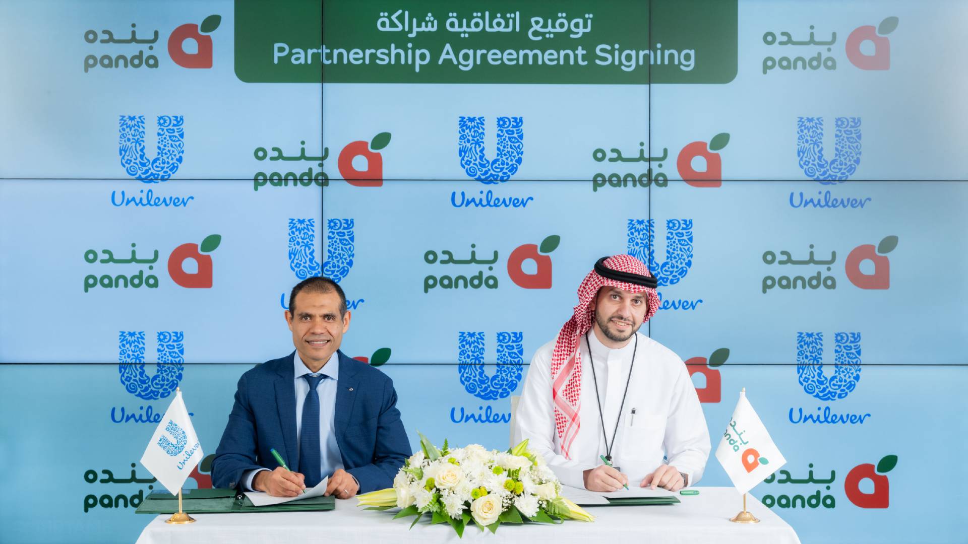 Head of Logistics Mohamed ElZouka signing the agreement with Panda
