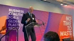 Alan Jope speaking from a podium on financials at the 77th United Nations General Assembly during Climate Week in New York