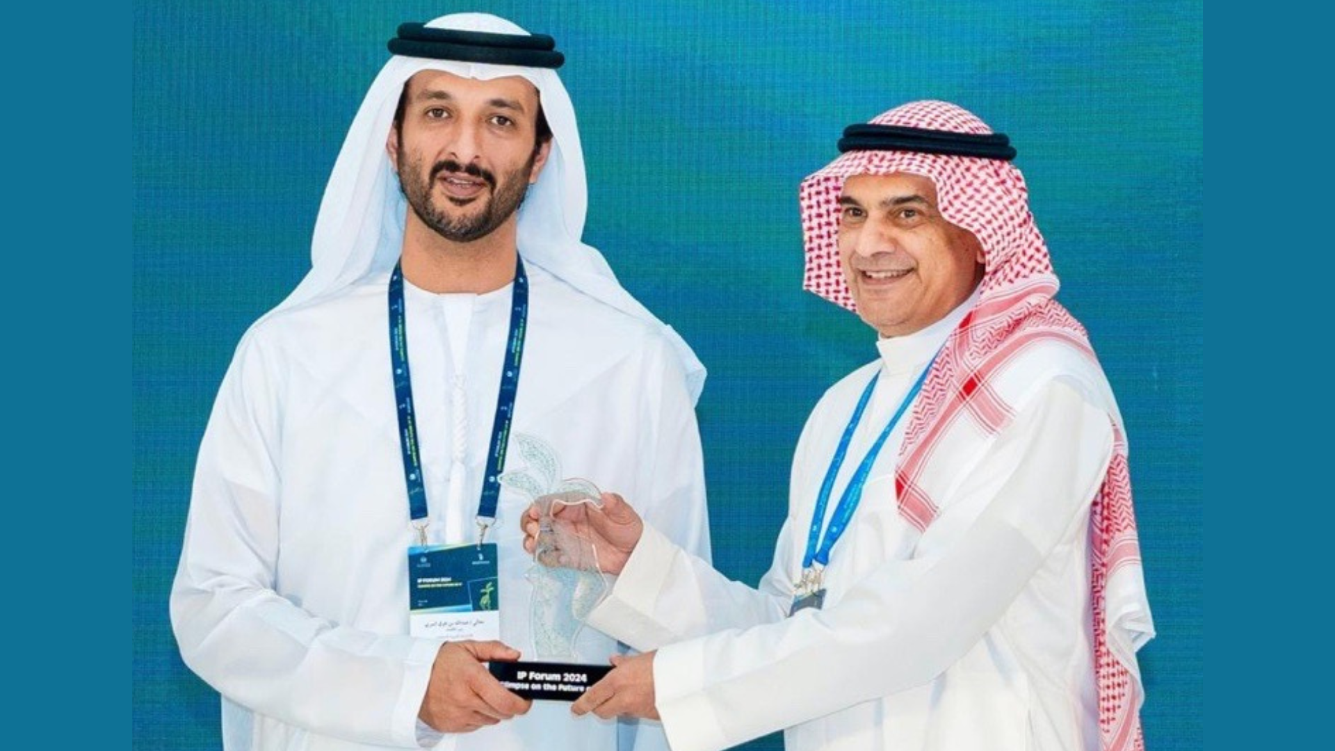Brand Protection Director Isam receiving the award from Minister or UAE Economy