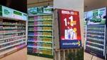 Pharmacy product displays and a large Al-Dawaa promotional billboard in Saudi Arabia