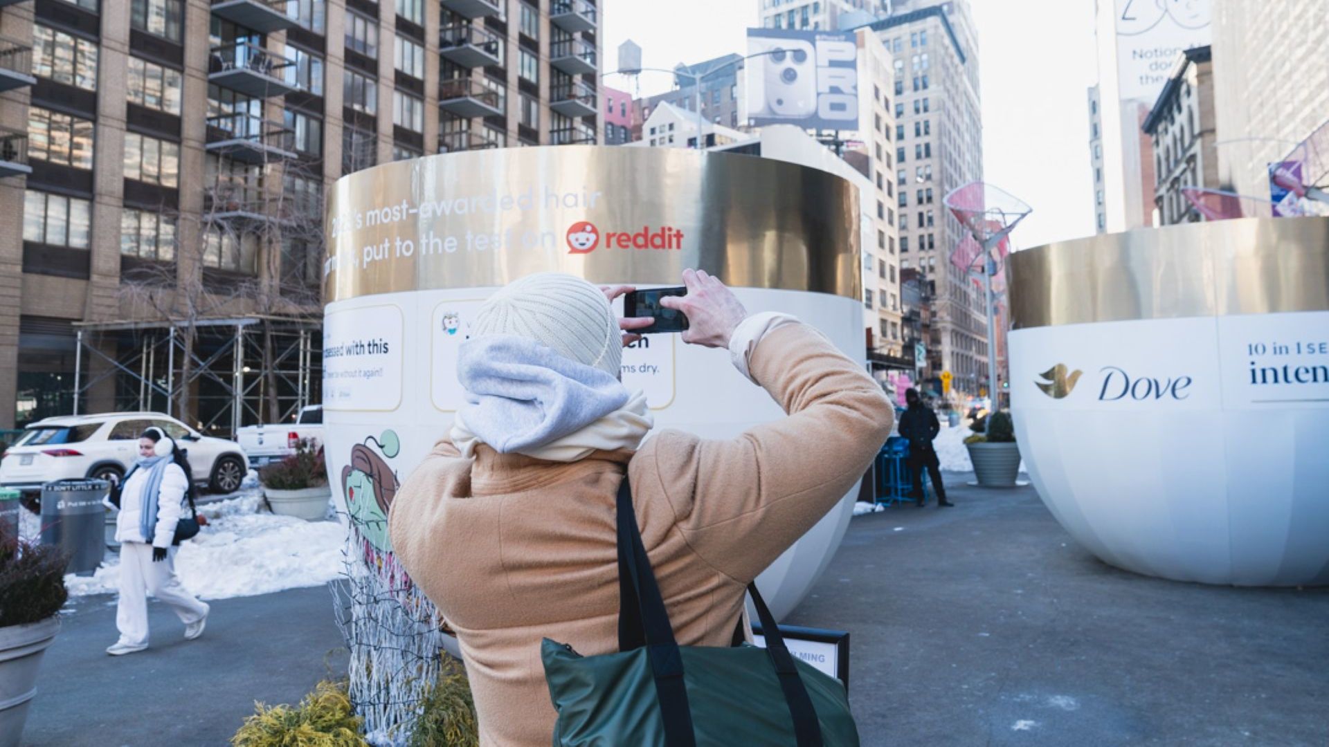 Giant jars of Dove hair mask in New York’s Flatiron district, part of a promotional pop-up for the brand’s Reddit campaign.