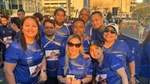 Employees grouped together at the marathon